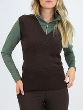 Load image into Gallery viewer, Mid-gauge knit vest made in responsibly produced merino wool blend. Rib-knitted tall collar with placket of large horn imitation buttons. 
