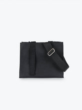 Load image into Gallery viewer, Stylish and functional cotton canvas grooming bag. Shoulder strap is adjustable and detachable, and the matching handles have leather details.
