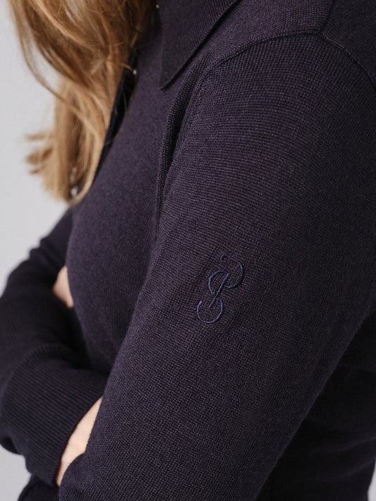 Fine knit sweater made in responsibly produced merino wool blend. Flat-knitted rib collar with matching deep cuffs. Hidden snap buttons at front placket enable varying styling of the sweater, which has a slim fit and tonal logo embroidery at sleeve.
