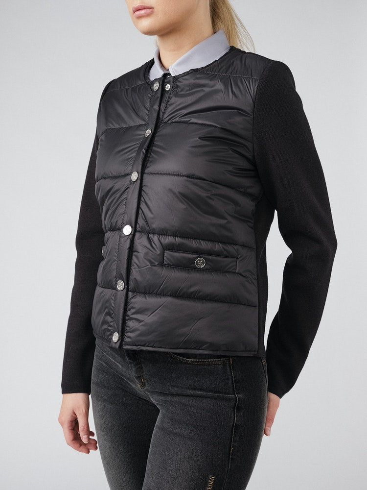 Jacket with a padded front and full logo button closing. Back and sleeves are made in a warm, tight knitted merino blend. Detailed with a rounded, scooped neck and two welt pockets at front.
