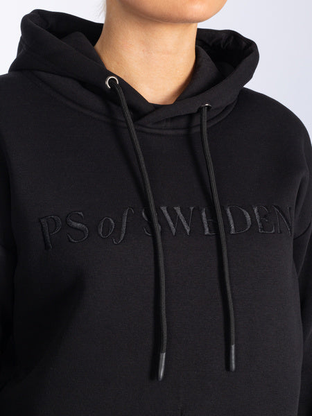 Soft, comfortable hoodie designed with a super smooth inside and drawstrings. The hoodie has a straight boxy fit and is designed with two spacious pockets on both sides, and a text logo embroidery in front.