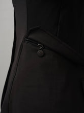 Load image into Gallery viewer, High function, tailored competition blazer made in a technical, stretchy material with a perfect fit. Button closing at the front and a hidden zipper underneath. Pockets at sides with hidden, discreet zippers. Double mesh (non-see through) on the back, sides and under arms for optimal ventilation. Design details such as shiny lining inside peplum and tonal logo on left sleeve.

